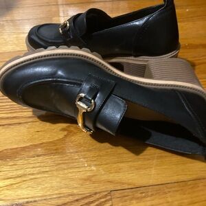 Elegant Black Loafers with Gold Accent